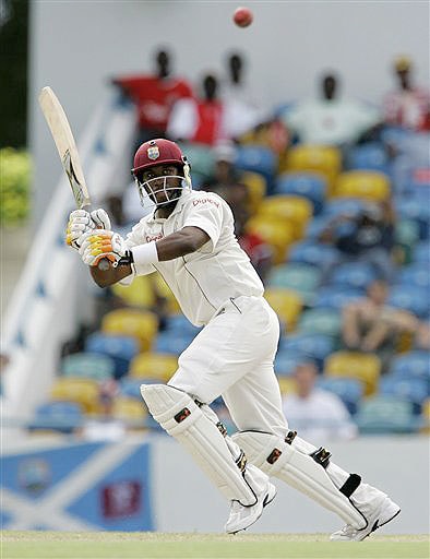 West Indies' batsman Dwayne Bravo plays a shot on the second day of the third and final Test against Australia at Kensington Oval in Bridgetown, Barbados on June 13, 2008. Day 2: Aus vs WI, 3rd Test
